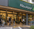 Fachada de supermercado Pão de Açúcar em dia de movimento comercial